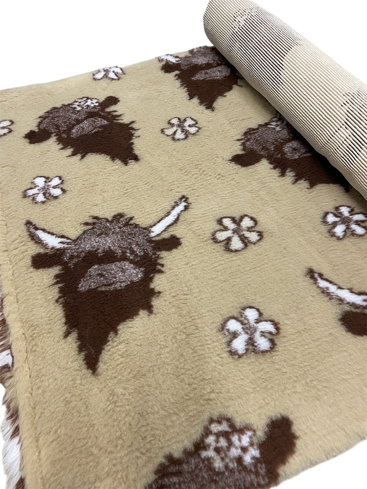 Beige vet bedding roll with Highland cow design for dogs and small puppies