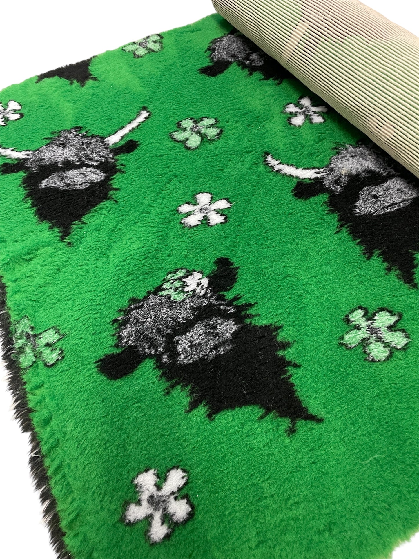 Green vet bedding roll with Highland cow design for dogs and small pets